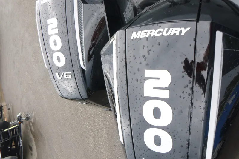 Slide: The Image of Mercury 200 V6 outboard engines on KingFisher 2825 Coastal Express, 2027 model. - 23
