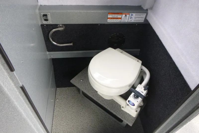 Slide: The Image of Compact marine toilet in 2027 KingFisher 2825 Coastal Express boat interior. - 14