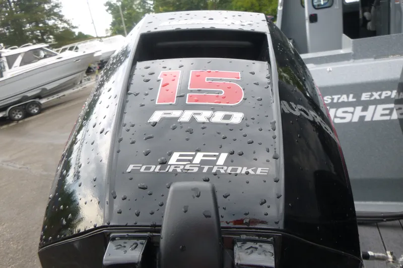 Slide: The Image of Outboard motor on 2027 KingFisher 2825 Coastal Express, featuring EFI FourStroke technology. - 24