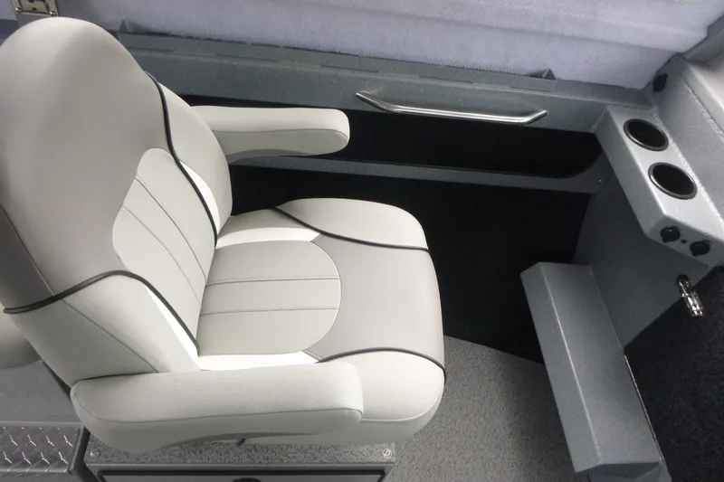 Slide: The Image of Captain's chair in 2027 KingFisher 2825 Coastal Express boat interior. - 11