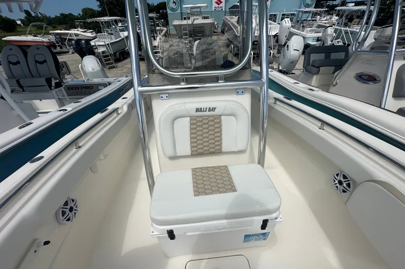 Slide: The Image of 2027 Bulls Bay 255 Center Console boat interior with seating and storage. - 9