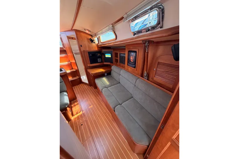Slide: The Image of Interior of 2002 Sabre 362 sailboat with wooden finish and comfortable seating. - 84