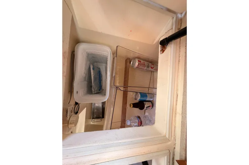 Slide: The Image of Small refrigerator with drinks and ice pack, Sabre 362, 2002 model. - 47