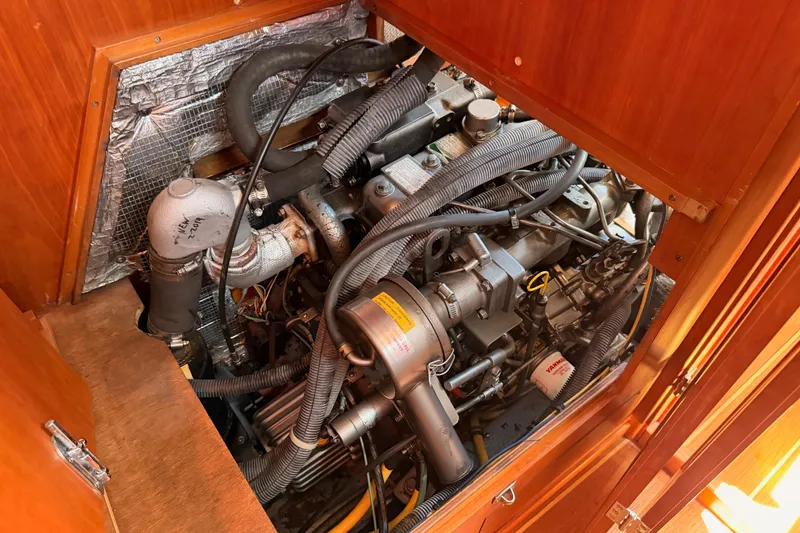 Slide: The Image of Engine compartment of a 2002 Sabre 362 sailboat, showcasing detailed mechanical components. - 88