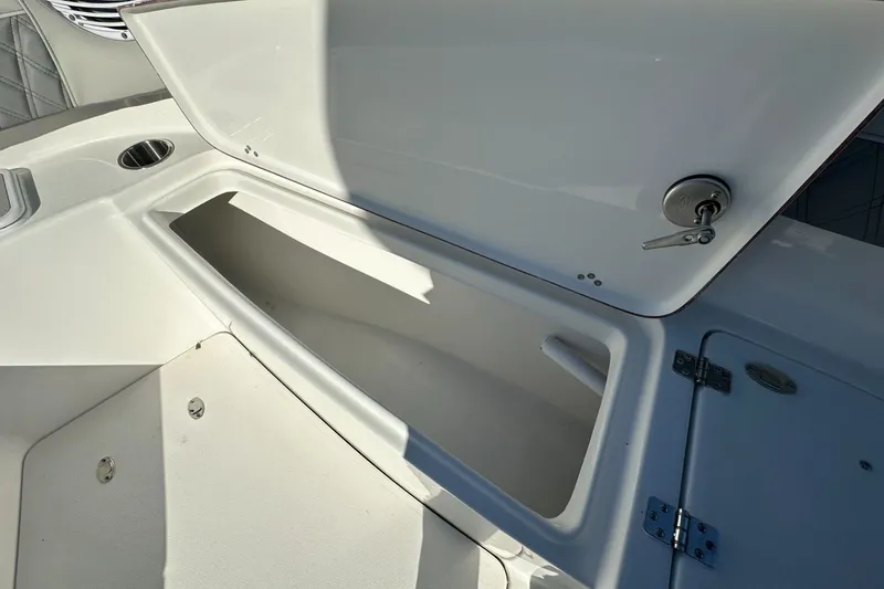 Slide: The Image of Open storage compartment on 2025 Sea Pro 322 Offshore boat, showcasing interior space. - 11