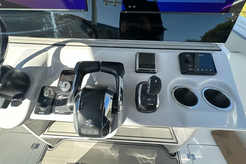 Slide: The Image of Control panel of 2025 Sea Pro 322 Offshore boat with modern navigation equipment. - 5
