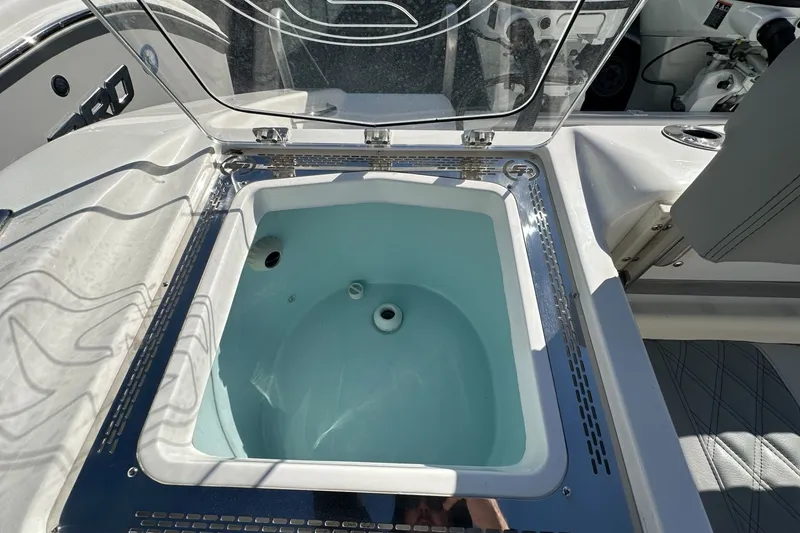 Slide: The Image of Livewell on 2025 Sea Pro 322 Offshore boat, featuring sleek design and functionality. - 21