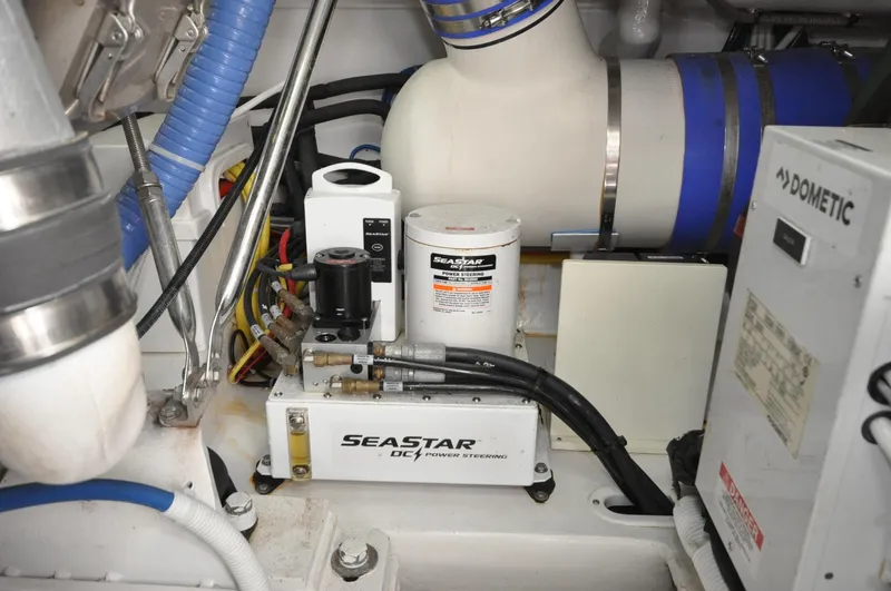 Slide: The Image of Engine room of 2019 Viking 44 Convertible with SeaStar hydraulic system and Dometic equipment. - 19