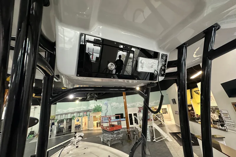 Slide: The Image of 2026 Sea Pro 230 Bay boat interior with control panel and modern design. - 6