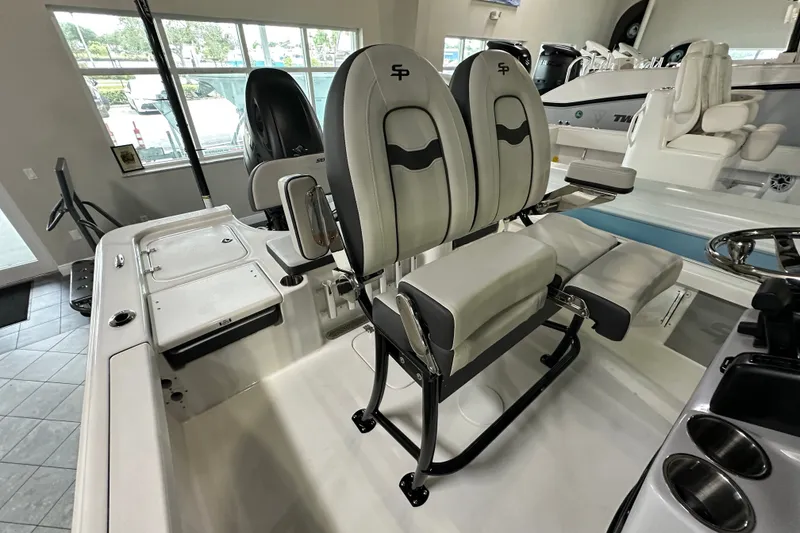 Slide: The Image of 2026 Sea Pro 230 Bay boat interior with dual seats and modern design. - 14