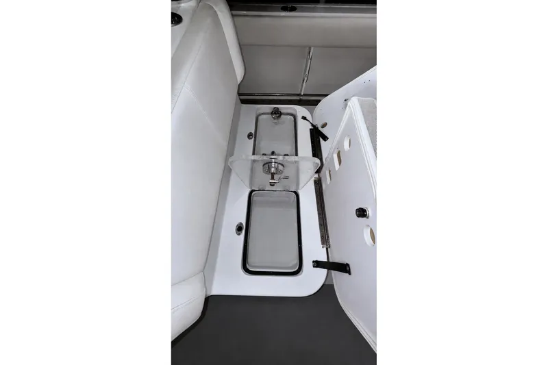 Slide: The Image of 2022 Sea Hunt Gamefish 27FS interior detail, showcasing seating and storage area. - 26
