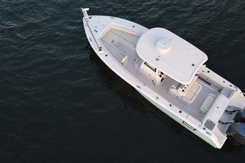 Slide: The Image of Aerial view of 2022 Sea Hunt Gamefish 27FS boat on water. - 9