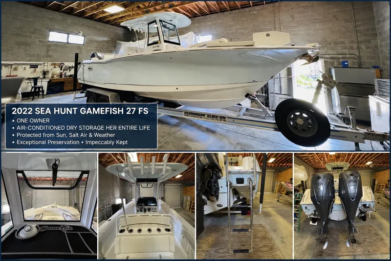 Slide: The Image of 2022 Sea Hunt Gamefish 27FS boat in storage, well-preserved, with dual engines and trailer. - 33