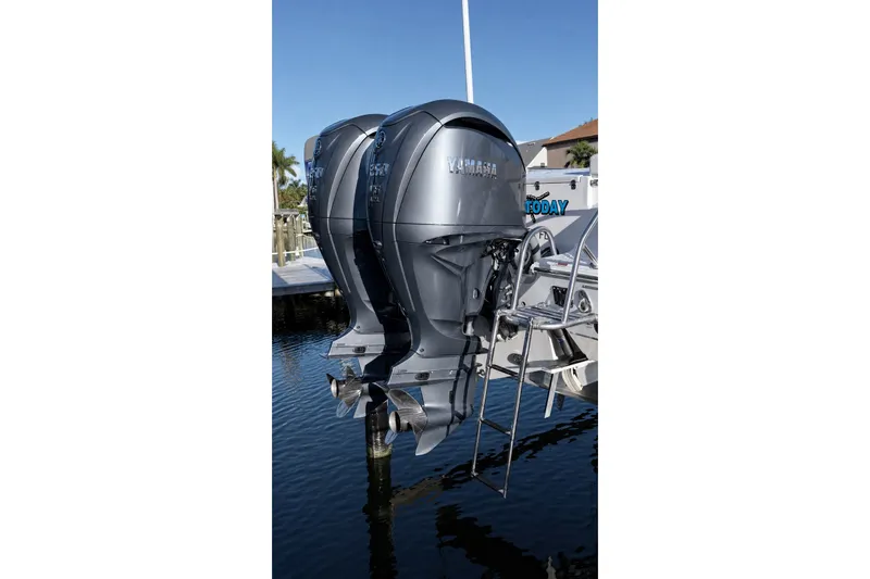 Slide: The Image of Twin Yamaha outboard motors on a 2022 Sea Hunt Gamefish 27FS boat. - 36
