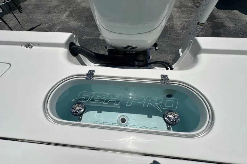 Slide: The Image of 2026 Sea Pro 250 Bay boat livewell with logo, showcasing sleek design and functionality. - 13