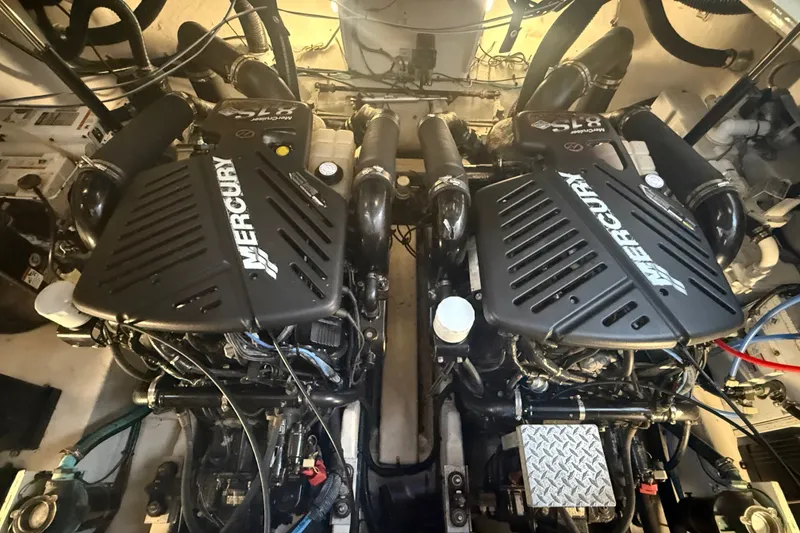 Slide: The Image of Engine room of a 2007 Sea Ray 340 Sundancer with twin Mercury engines. - 28