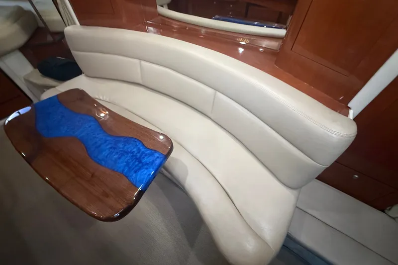 Slide: The Image of Luxurious interior of 2007 Sea Ray 340 Sundancer with elegant seating and stylish table. - 19