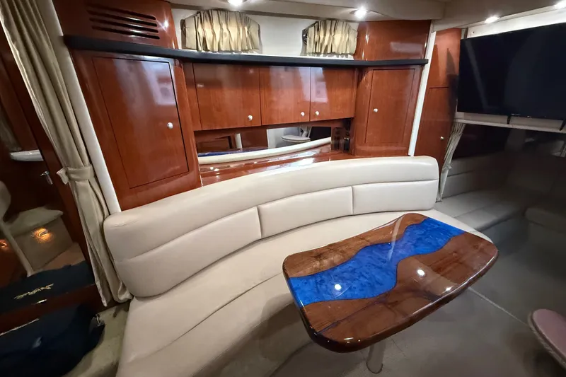 Slide: The Image of Luxurious interior of 2007 Sea Ray 340 Sundancer with elegant wood cabinetry and plush seating. - 23