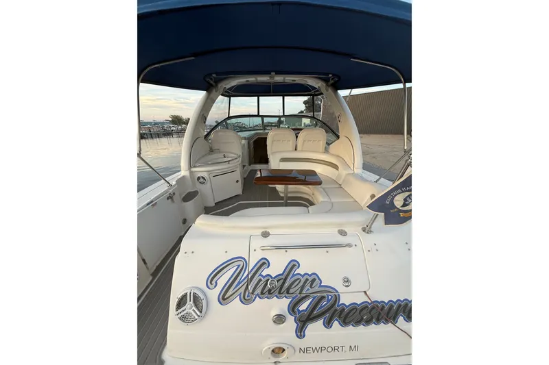 Slide: The Image of 2007 Sea Ray 340 Sundancer boat with seating area, docked in Newport, MI. - 7
