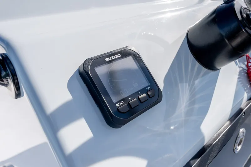 Slide: The Image of Suzuki display on 1980 Sea Ox 230 Center Console boat dashboard. - 19