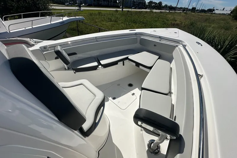 Slide: The Image of 2026 Sea Pro 262 Offshore boat interior with cushioned seating and sleek design. - 4