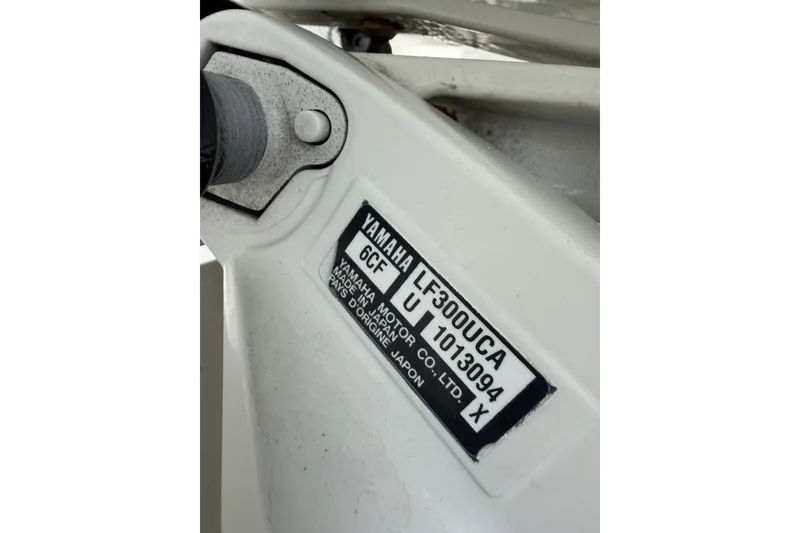 Slide: The Image of Label on Yamaha motor, model LF300UCA, attached to a 2019 Jupiter 30 boat. - 44