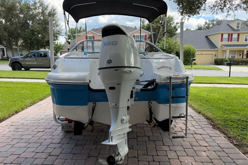 Slide: The Image of 2021 Campion Allante 180 boat with outboard motor on a driveway. - 6