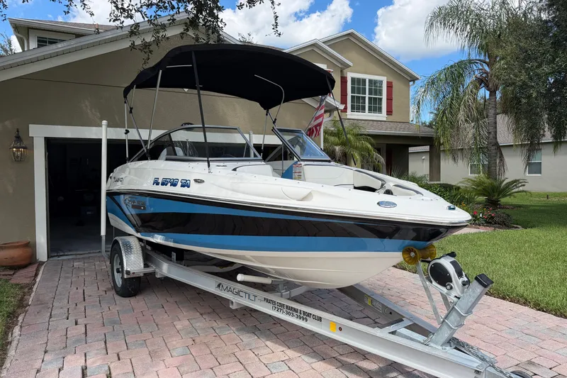 Slide: The Image of 2021 Campion Allante 180 boat on trailer in residential driveway. - 3