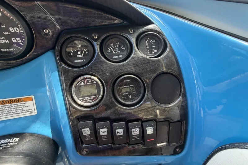Slide: The Image of Dashboard of 2021 Campion Allante 180 boat with Suzuki gauges and controls. - 23