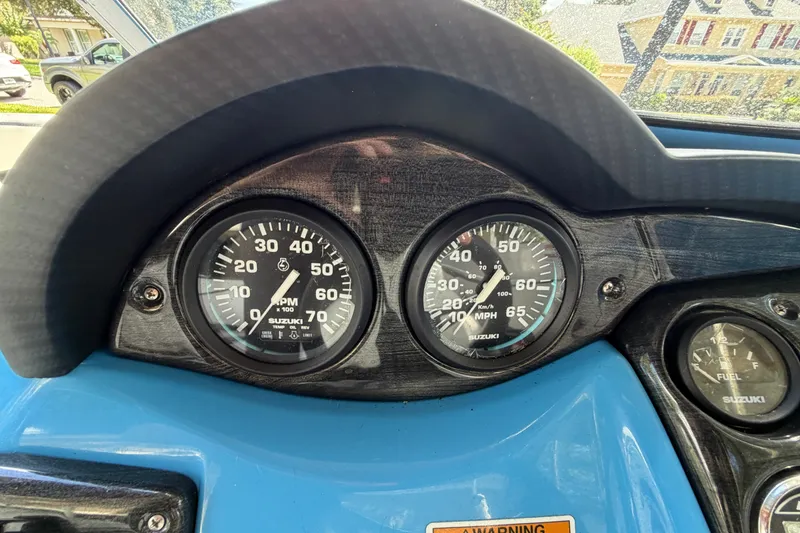 Slide: The Image of Dashboard of 2021 Campion Allante 180 boat with Suzuki gauges. - 18