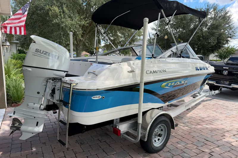 Slide: The Image of 2021 Campion Allante 180 boat with Suzuki outboard motor on a trailer. - 5