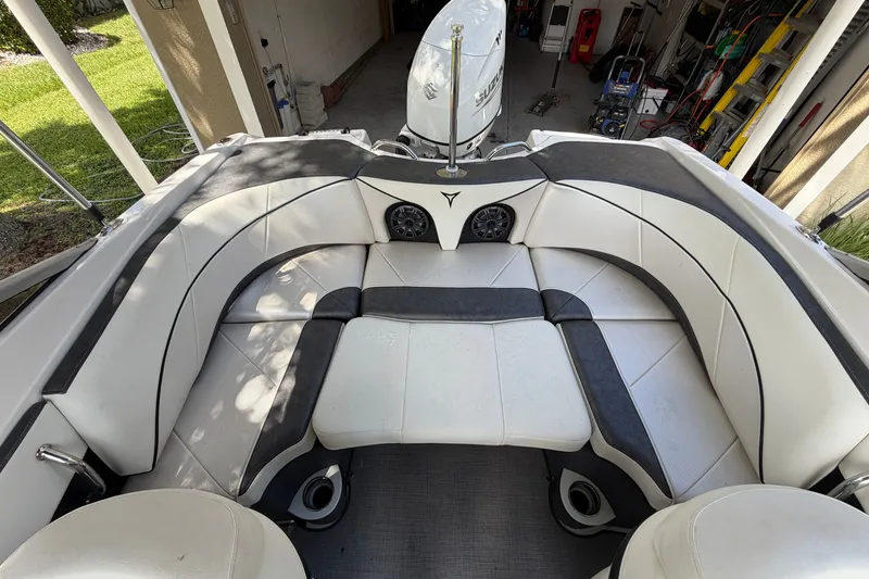Slide: The Image of Interior of a 2021 Campion Allante 180 boat with white and black seating. - 12