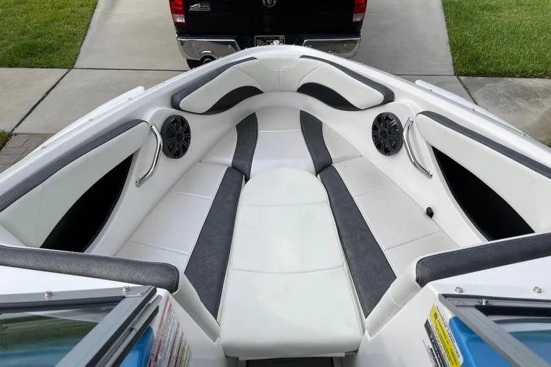 Slide: The Image of Interior of 2021 Campion Allante 180 boat with white and gray seating and speakers. - 8
