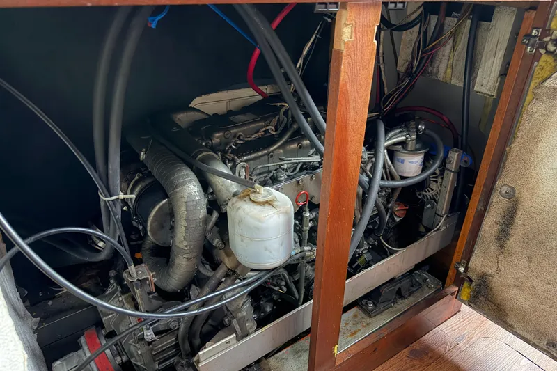 Slide: The Image of Engine compartment of a 2011 Custom Build 50' Ketch, showcasing intricate mechanical components. - 61