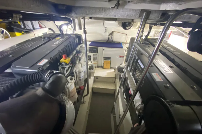 Slide: The Image of Engine room of 2006 Cruisers Yachts 520 Express with Volvo engines and equipment. - 86
