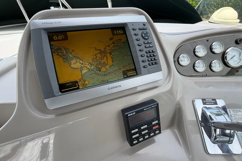 Slide: The Image of Dashboard of a 2001 Cruisers Yachts 3672 Express with Garmin GPSmap 4210 navigation system. - 18