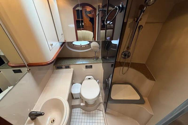 Slide: The Image of Bathroom interior of 2001 Cruisers Yachts 3672 Express with shower and sink. - 37