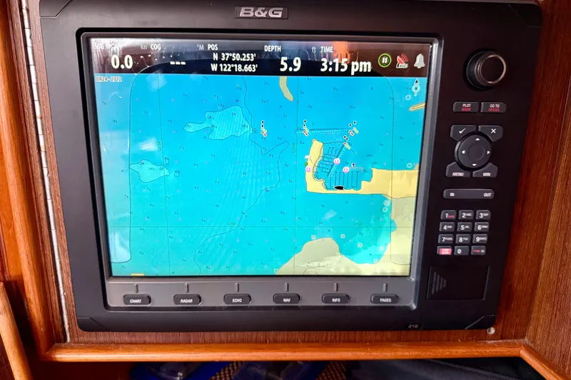 Slide: The Image of Navigation display on 1977 Hans Christian Ketch, showing nautical chart and coordinates. - 52