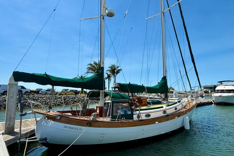 Slide: The Image of 1977 Hans Christian Ketch sailboat docked in sunny marina, San Francisco, CA. - 8