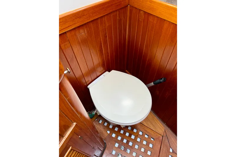 Slide: The Image of Wood-paneled marine toilet in 1977 Hans Christian Ketch sailboat. - 50