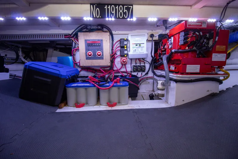 Slide: The Image of Electrical system in the engine room of a 2006 Custom Carolina 36 Express. - 49