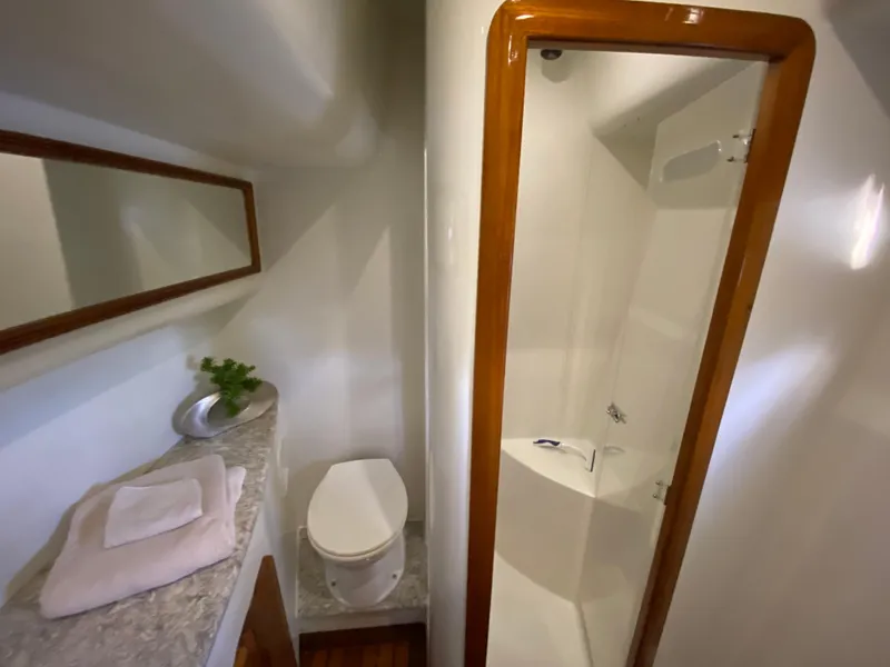 Slide: The Image of Bathroom interior of 1995 Mares 58 Power Cat with shower and toilet. - 53