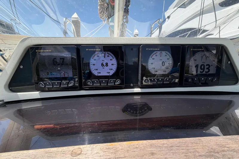 Slide: The Image of Sailing instruments on a 1987 Moody 376 yacht displaying speed and navigation data. - 20
