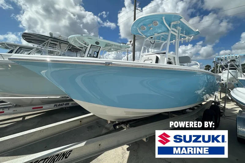 The Image of 2026 Sea Pro 225FLX Sandbar boat on trailer, powered by Suzuki Marine. - 0