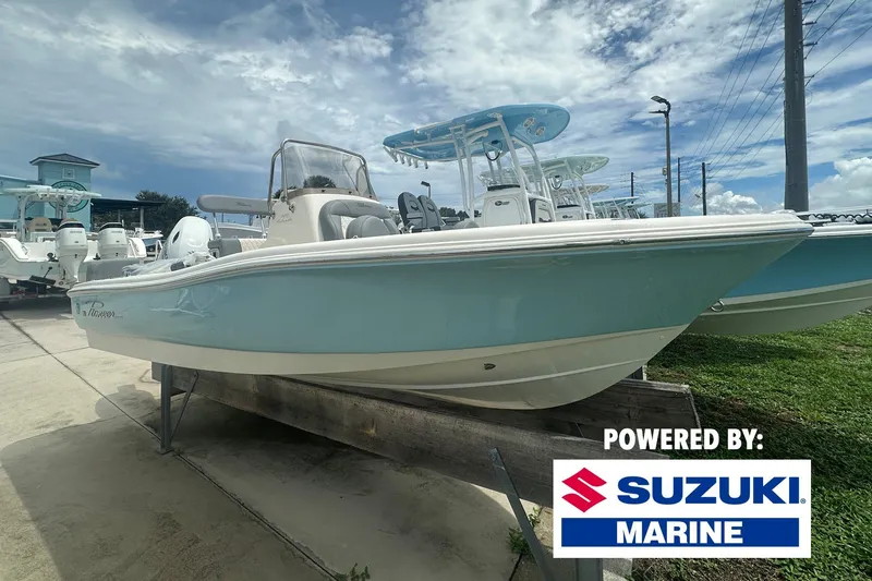 The Image of 2027 Pioneer 180 Islander boat with Suzuki Marine engine, displayed outdoors. - 0