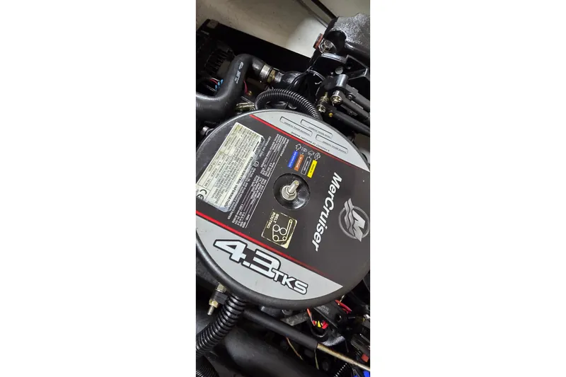 Slide: The Image of MerCruiser 4.3 TKS engine in a 2012 Hornet Marine 17 boat. - 32