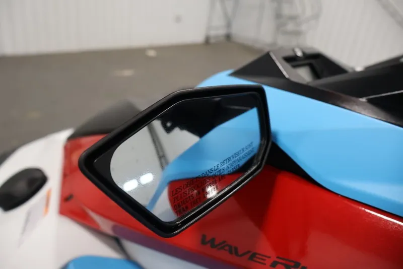 Slide: The Image of 2027 Yamaha WaveRunner JetBlaster DLX 3-Up side mirror and colorful body detail. - 16