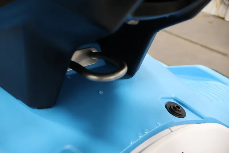 Slide: The Image of Close-up of 2027 Yamaha WaveRunner JetBlaster DLX 3-Up, showcasing blue hull detail. - 21