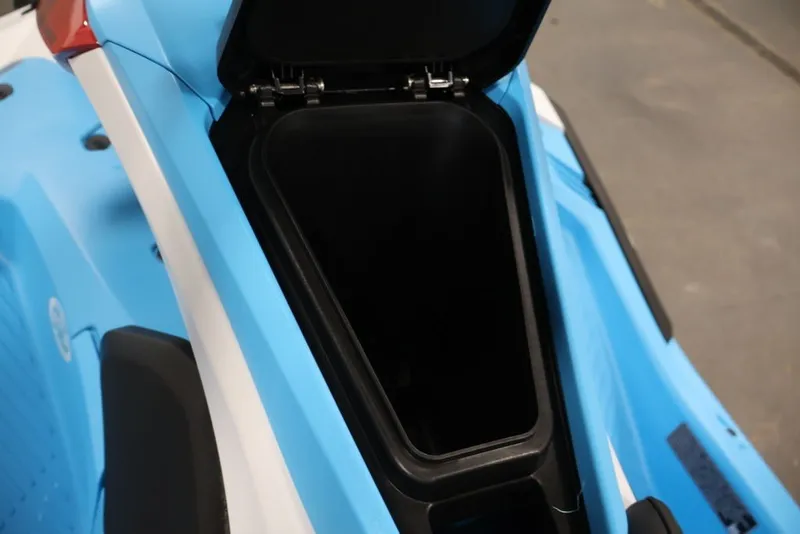 Slide: The Image of Open storage compartment of 2027 Yamaha WaveRunner JetBlaster DLX 3-Up in blue. - 15