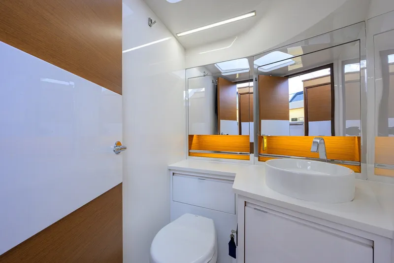 Slide: The Image of Luxurious bathroom interior of 2018 Bertram 35 Flybridge yacht with modern fixtures. - 46